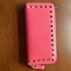 Practically new Valentino 7.5 x 3.75 wallet. Holds 12 cards w room for receipts